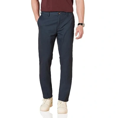 Abbildung von Amazon Essentials Herren Knitterarme Flatfront Chinohose, Enger Schnitt, Marineblau, 33W / 29L