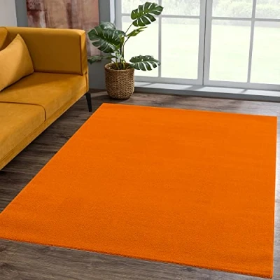 Abbildung von SANAT Kurzflor Teppich Wohnzimmer Uni Modern Teppiche fürs Schlafzimmer, Arbeitszimmer, Büro, Flur, Kinderzimmer und Küche Orange, 80 x 200 cm