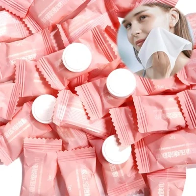 Abbildung von Komprimiertes Handtuch Einweg,100 Stück Tabletten Handtuchpillen Mini Vliesstoffe Tragbar Platzsparend Biologisch Abbaubar Komprimiert Handtücher für Urlaub Reisen Sport