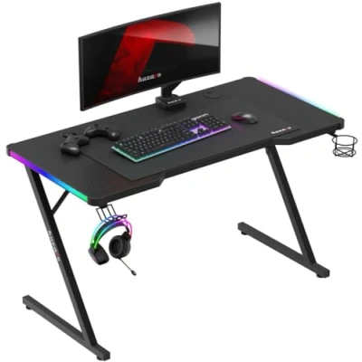 Abbildung von huzaro Hero 2.5 RGB Beleuchtung LED PC Tisch Gaming Schreibtisch Computertisch Getränkehalter Kopfhörerhalter USB Ladeanschluss Homeoffice Gamer Carbon Tischplatte 120x60cm Schwarz