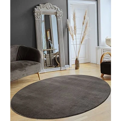Abbildung von the carpet Relax Moderner Flauschiger Kurzflor Teppich, Anti Rutsch Unterseite, Waschbar bis 30 Grad, Super Soft, Felloptik, Anthrazit, 140 x 200 cm Oval