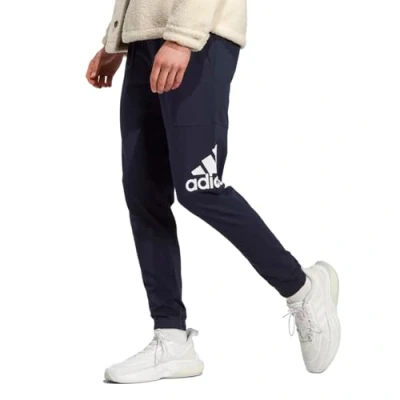 Abbildung von adidas Sportswear Essentials Single Tapered Pants Jogginghose, Herren, Größe: Small, Legend ink