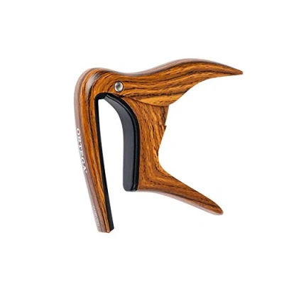 Abbildung von Ortega Guitars Capo für runde Griffbretter Walnut Design (OCAPOCV WND)