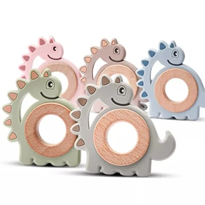 Abbildung von Dinosaurier Beißring für Baby Natur Holz &amp; Silikon grün Kauspielzeug, Zahnungshilfe Greifling Spielzeug Beissring als Geschenk zur Geburt nachhaltig BPA frei schadstofffrei