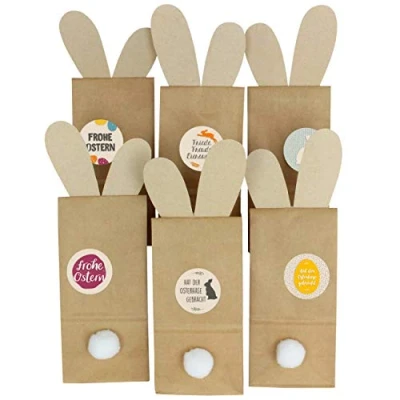 Abbildung von Papierdrachen 12 dekorative Osternester zum Befüllen Kraftpapiertüten mit Hasenohren Ausschneiden Oster Dekoration Tischdeko inkl. Aufkleber und Hasenpuschel Motiv Packpapier