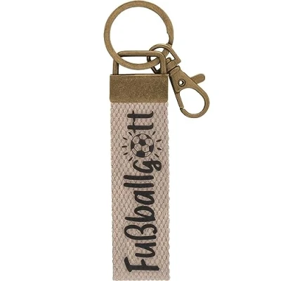 Abbildung von GRUSS &amp; CO Schlüsselanhänger Canvas Motiv Fußball Anhänger aus dunklem mit Fußballgott, Karabiner 48405
