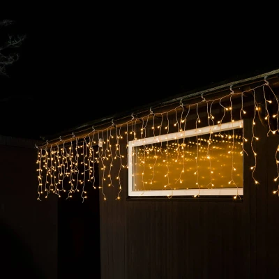 Abbildung von Konstsmide LED Eisregen Lichtervorhang, 200 bernsteinfarbene Dioden, 31V Außentrafo, weißes Kabel 2771 802