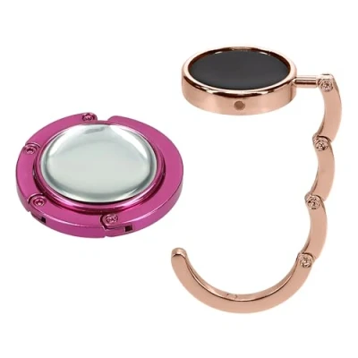Abbildung von kwmobile Taschenhalter für Tisch 2X Faltbare Antirutsch Handtaschenhalter Haken Taschen Aufhänger Geschenkidee Gadgets Frauen Taschenhaken Set in Rosegold Pink