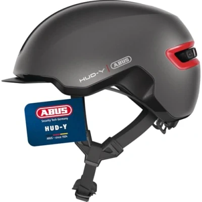 Abbildung von ABUS Urban Helm HUD Y mit magnetischem, aufladbarem LED Rücklicht &amp; Magnetverschluss cooler Fahrradhelm für den Alltag Damen und Herren Titan/Rot Matt, Größe S, S (51 55 cm)