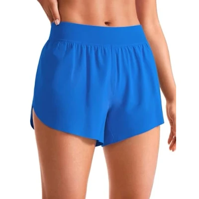 Abbildung von CRZ YOGA Damen Mid Waist Running Shorts Seitliche Splits Sport Workout Kurze Hose Leichte Atmungsaktive Sporthose Laufhose Funkelndes Blau 36