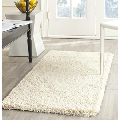 Abbildung von SAFAVIEH Zottelig Teppich für Wohnzimmer, Esszimmer, Schlafzimmer California Shag Collection, Hoher Flor, Elfenbein, 69 X 152 cm