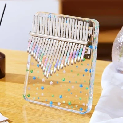 Abbildung von Hapihom 17 Ton Kalimba mit Klaviertasche, Daumenklavier,transparentes Fingerklavier aus Acryl Bedienungsanleitung Stimmhammer Soundaufkleber Reinigungstuch für Kinder und Erwachsene Anfänger