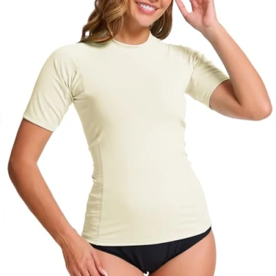 Abbildung von MEETWEE Damen Surf Rash Guard Sonnenschutz Badeanzug UV Schutz Shirt UPF 50+ Kurzarm Badeoberteil Schnell trocknendes Schwimm Sonnenschutzshirt für Wassersport.