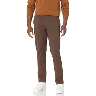 Abbildung von Amazon Essentials Herren Chinohose, Komfortabler, Gewaschener Stretch, Skinny Passform (Früher Goodthreads), Braun, 33W / 29L