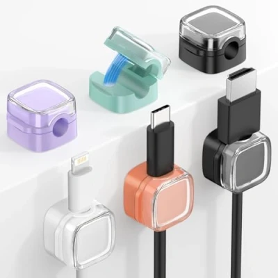 Abbildung von MoKo 6 Stück Magnetische Kabelschellen, Organizer Kabelmanagement, Kabelhalter Robust Magnetische, Kabel Management Clips für Nachttisch Schreibtisch Büro Auto Wand Glas, Orange/Lila/Blau/Weiß/Schwarz