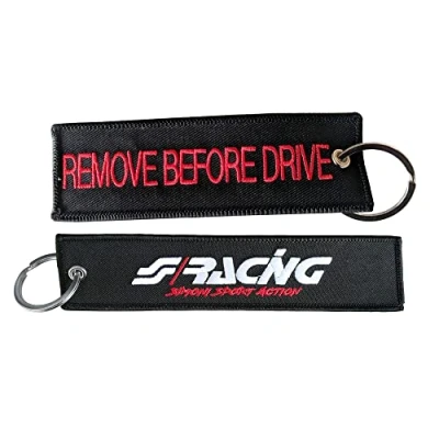 Abbildung von Simoni Racing SRK9 Schlüsselanhänger in Schwarzem Stoff Remove Before Drive, Schwarz