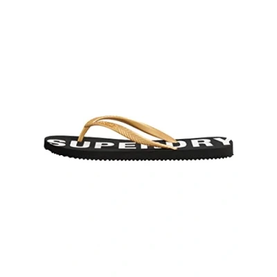Abbildung von Superdry Damen Code Essential FLIP Flop Flipflop, Black/Metallic Gold, Medium
