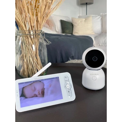 Abbildung von BÉABA, Babyphone mit Videofunktion, 720p HD Bildschirm, 360 Kamera, Nachtsicht, Handy App, Nachtlicht, Walkie Talkie, Schlaflieder, Thermometer und Luftfeuchtigkeitskontrolle, Zen Night Light Weiß