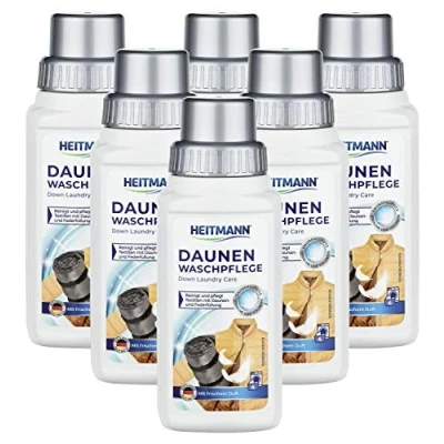 Abbildung von HEITMANN Daunen Wäsche: reinigt und pflegt Textilien mit Daunenfüllung, ideal für die schonende Reinigung von Jacken, Federkissen, Federbetten, 250ml, 6er Pack