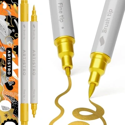 Abbildung von Artistro 2 Gold Acrylic Paint Pens, Markers Dual Tip (Brush + Fine 1 mm), for Fabric, Canvas, Rock, Glass, Wood, Paper, DYI, Kids and Adults