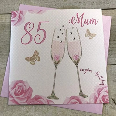 Abbildung von WHITE COTTON CARDS Geburtstagskarte zum 85. Geburtstag, Motiv: Champagnergläser, rosa Rosen, SS42 M85, 16 x cm