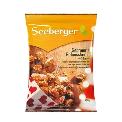 Abbildung von Seeberger Gebrannte Erdnusskerne mit Sesam, 12er Pack: Knackige karamellisierte Erdnüsse feinem Sesam ummantelt intensives Aroma glutenfrei, vegan (12 x 150 g)