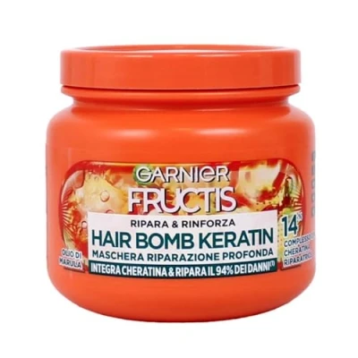 Abbildung von Garnier Fructis Tiefenreparatur Maske für stärkeres Haar, mit Marulaöl und Keratin, Hair Bomb Reparatur Stärkung, 320 ml