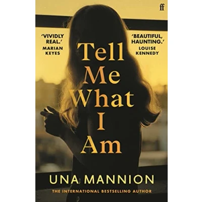 Abbildung von Tell Me What I Am: &#039;Beautiful, haunting.&#039; LOUISE KENNEDY