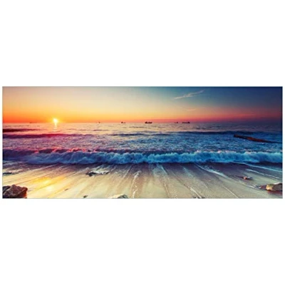 Abbildung von Wallario Glasbild Sonnenuntergang am Meer mit Wellen Strand 50 x 125 cm Wandbilder Glas in Premium Qualität: Brillante Farben, freischwebende Optik