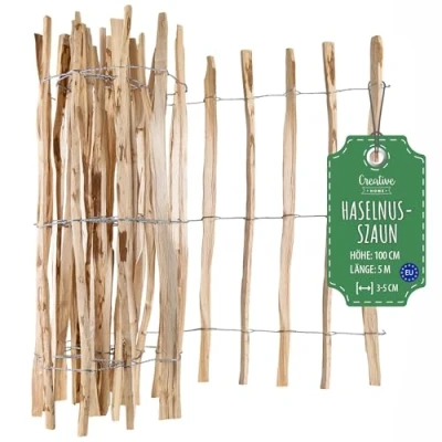 Abbildung von Creative Home Staketenzaun 100cm hoch und 5m lang Haselnusszaun Rollzaun Lattenabstand 3 5 cm Gartenzaun Holz Holzzaun Zaun Garten Ideal als Rasenkante Blumenbeet Umrandung aus Haselnuss