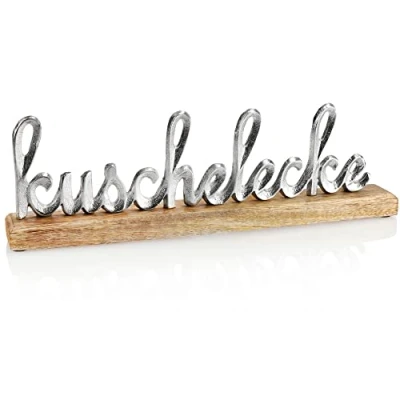Abbildung von com four® Deko Aufsteller KUSCHELECKE Schriftzug aus Metall auf Mangoholz Sockel zum Hinstellen 40,5x12,5x5cm (silberfarben KUSCHELECKE)