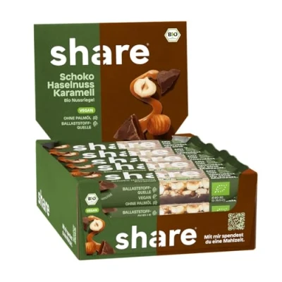 Abbildung von share Nussriegel Schoko Haselnuss Karamell 15 x 35 g Bio Riegel spenden je eine Mahlzeit an einen Menschen in Not Haselnüsse, dunkle Schokolade &amp; vegan ohne Palmöl