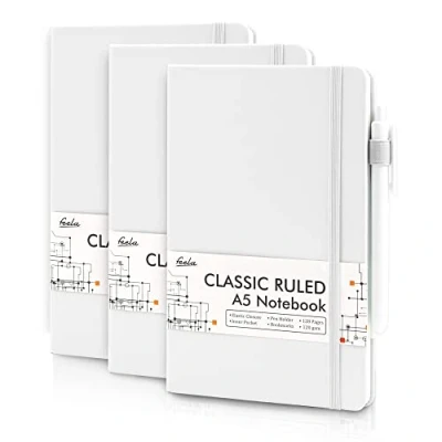 Abbildung von feela Notizbücher, Tagebücher, Hardcover, Notizbuch, klassisch, liniert, mit Stifthalter, für Arbeit, Business, Journaling, Notizen, 3 schwarzen Stiften, 120 g/m², 13 x 21 cm, A5, Weiß, Stück