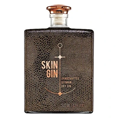 Abbildung von Skin Gin Handcrafted German Reptile Brown, Manufaktur aus dem Alten Land Koriander Grapefruit Limetten 42% 500ML