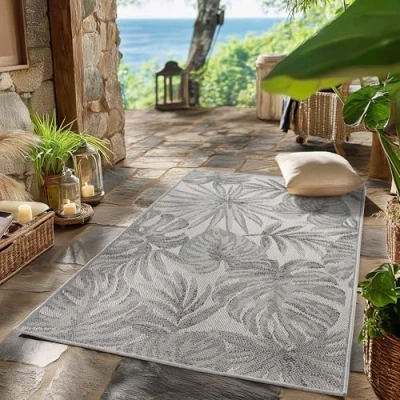 Abbildung von SIMPEX Outdoor Teppich Wetterfest Grau 80x150 cm Läufer, UV beständig, ideal für Küche, Balkon, Terrasse auch Wohnzimmer und Esszimmer, Palmblätter Design, Pfelgeleicht