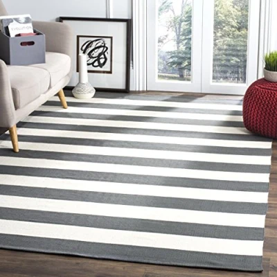 Abbildung von SAFAVIEH Modern Teppich für Wohnzimmer, Esszimmer, Schlafzimmer Montauk Collection, Kurzer Flor, Grau und Elfenbein, 152 X 244 cm