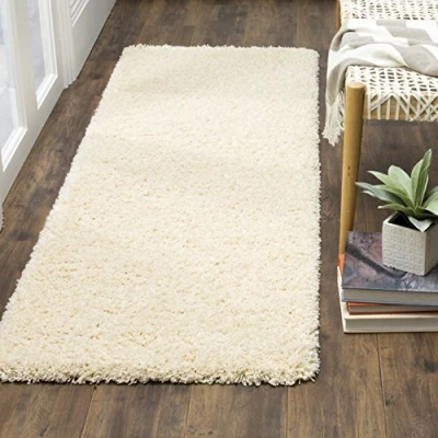 Abbildung von SAFAVIEH Zottelig Teppich für Wohnzimmer, Esszimmer, Schlafzimmer California Shag Collection, Hoher Flor, Elfenbein, 69 X 213 cm