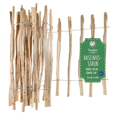 Abbildung von Creative Home Staketenzaun 70cm hoch und 5m lang Haselnusszaun Rollzaun Lattenabstand 3 5 cm Gartenzaun Holz Holzzaun Zaun Garten Ideal als Rasenkante Blumenbeet Umrandung aus Haselnuss