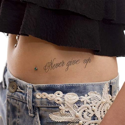 Abbildung von 5 x Never give up Tattoo Schriftzug in schwarz Temporary Haut (5)