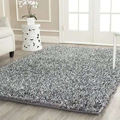 Abbildung von SAFAVIEH Zottelig Teppich für Wohnzimmer, Esszimmer, Schlafzimmer New Orleans Shag Collection, Hoher Flor, Platin und Elfenbein, 91 X 152 cm