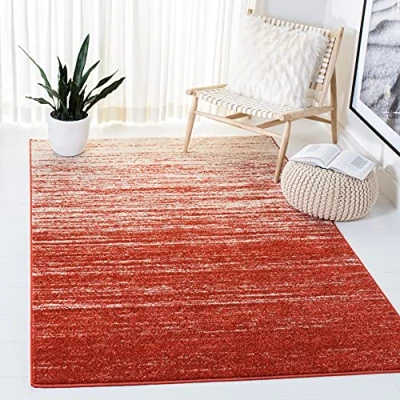 Abbildung von SAFAVIEH Modern Teppich für Wohnzimmer, Esszimmer, Schlafzimmer Adirondack Collection, Kurzer Flor, Orange und Grau, 91 X 152 cm