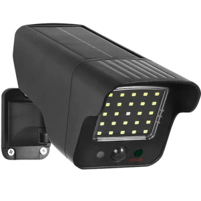 Abbildung von Maclean Solar Kamera Attrappe mit Bewegungsmelder und LED Licht IP Überwachungskamera Objektiv IP65 für den Außenbereich 216/149 Lumen, 6500K Blinkende rote (1 Stück)