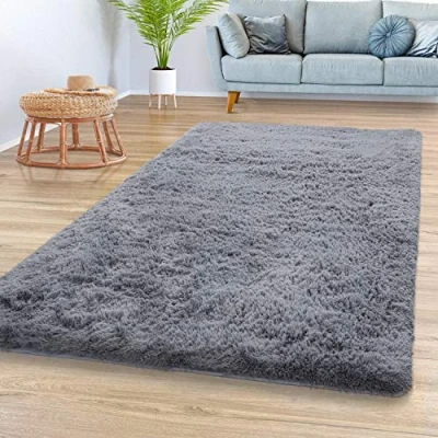 Abbildung von TT Home Teppich Wohnzimmer Hochflor Langflor Weich Soft Modernes Einfarbiges Design, Farbe: Grau, Größe:140x200 cm