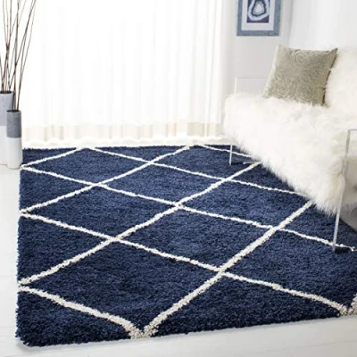 Abbildung von SAFAVIEH Zottelig Teppich für Wohnzimmer, Esszimmer, Schlafzimmer Hudson Shag Collection, Hoher Flor, Marine und Elfenbein, 91 X 152 cm