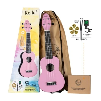 Abbildung von Ortega Guitars Sopran Ukulele rosa Keiki K2 Starterkit inklusive Tuner, Gurt, 5 Medium Plektren &amp; Kordelzugtasche pastell/fairy dust (K2 FYD)