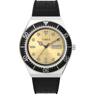 Abbildung von Timex Q Automatic Herren Armbanduhr, 40 mm, Edelstahl Synthetikkautschuk Armband, champagnerfarbenes Zifferblatt, Edelstahlgehäuse TW2W47600