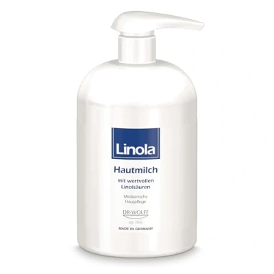 Abbildung von Linola Hautmilch 500 ml im Spender Körperlotion bei allen Formen trockener, beanspruchter sowie zu Neurodermitis neigender Haut