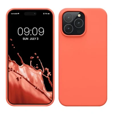Abbildung von kwmobile Hülle für das iPhone 14 Pro Max dünnes Silikon Handy Case stoßfeste Handyhülle mit weicher Oberfläche unterstützt kabelloses Laden Leuchtende Koralle