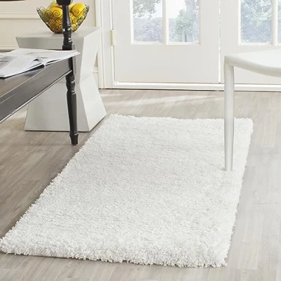 Abbildung von SAFAVIEH Zottelig Teppich für Wohnzimmer, Esszimmer, Schlafzimmer California Shag Collection, Hoher Flor, Weiss, 69 X 152 cm