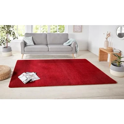 Abbildung von Hanse Home Nasty Teppich Wohnzimmerteppich Flauschiger Kurzflor Einfarbig Unifarben für Esszimmer, Wohnzimmer, Kinderzimmer, Flur, Schlafzimmer, Küche Uni Rot, 140x200cm